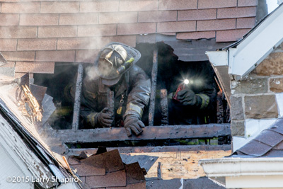 Chicago firefighters at the scene of a Still & Box Alarm fire that damaged three homes originating at 6125 S Justine 2-4-16 fire scene photos Larry Shapiro photographer shapirophotography.net